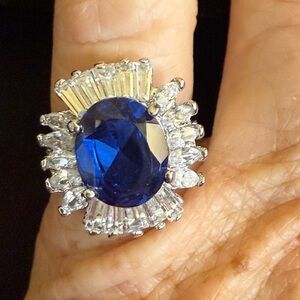 Elegant Blue Stone  and CZ set in Sterling Ring